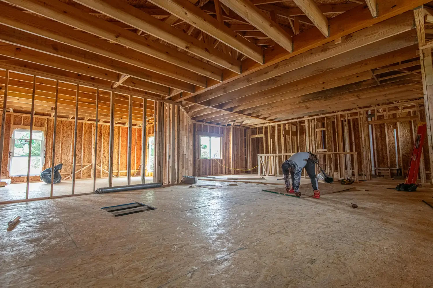 Wood stud wall framing with blocking installed before drywall.